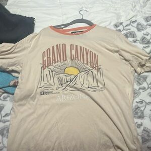 This is a cream large shirt.